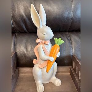 Bunny Figurine with pink bow Holding Orange Carrot